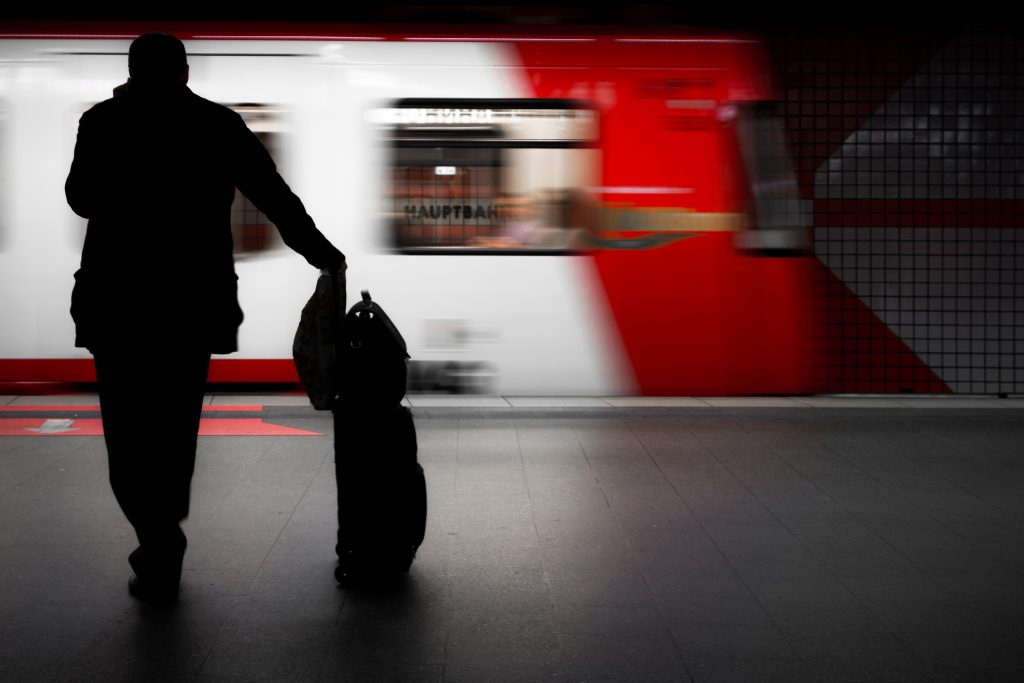 male silhoutte with train